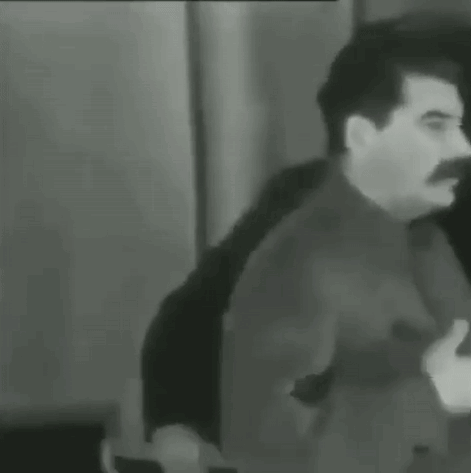 Man with Mustache Next to Suit