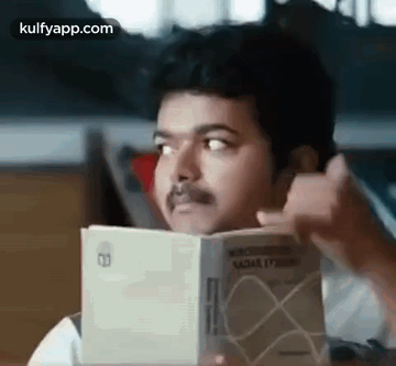 Man With Mustache Reading Book GIF