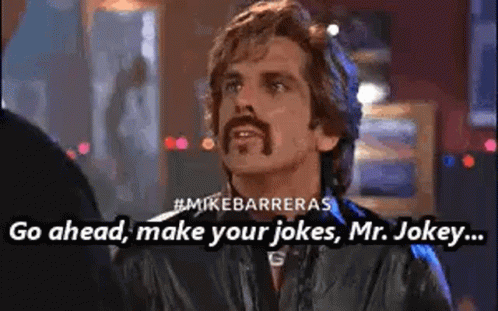 Man With Mustache Saying Go Ahead Make Your Jokes Mr Jokey