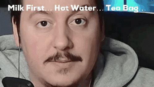 Man With Mustache Saying Milk First Hot Water Tea Bag GIF