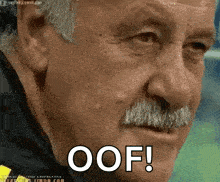 Man With Mustache Saying Oof In Front of Face