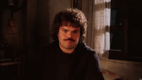 Man with Mustache Saying Whatever