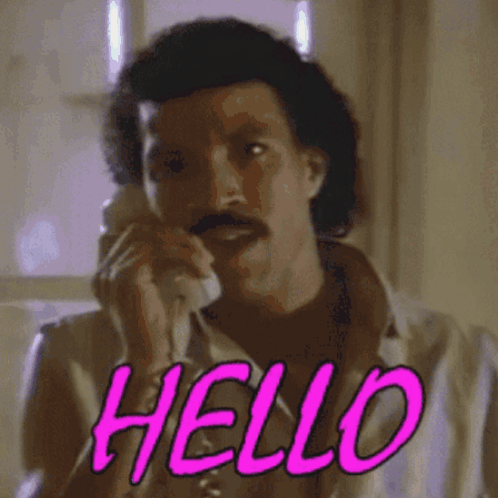 Man with Mustache Talking on Phone Hello