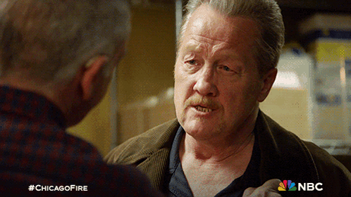 Man With Mustache Talking To Another Man #Chicagofire GIF