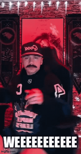 Man with Mustache Wearing 1000 Hat
