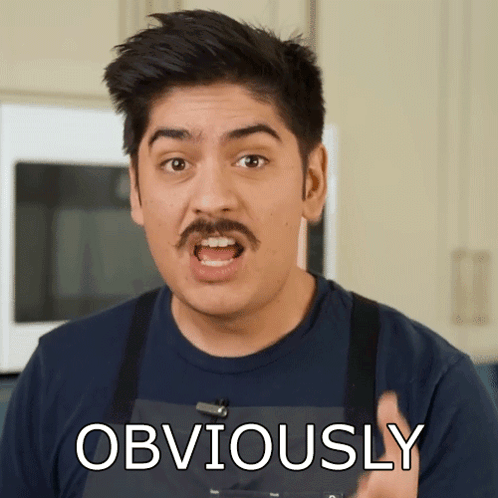 Man With Mustache Wearing Apron Says Obviously