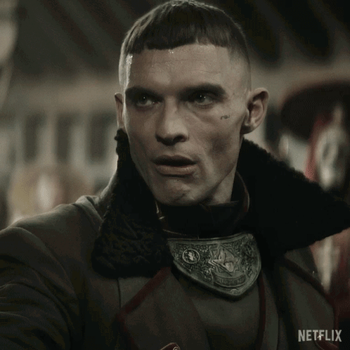 Man With Netflix Advertisement Behind Him