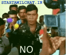 Man With No Shirt Being Interviewed GIF