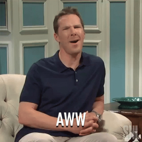 Man With Open Mouth and Aww on Chest