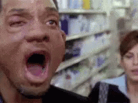 Man With Open Mouth In Store GIF