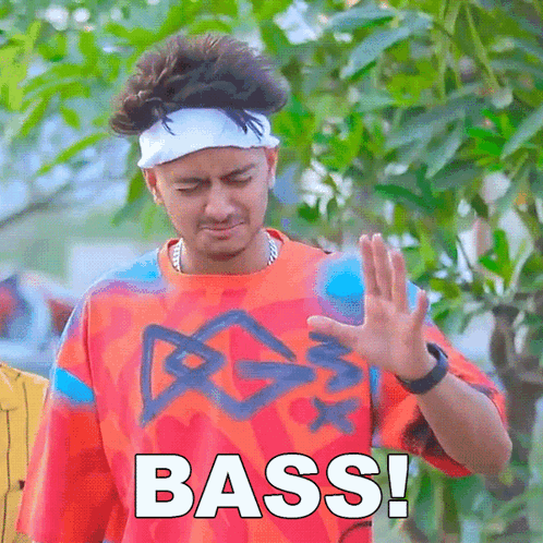 Man with Orange Shirt and Headband Says Bass