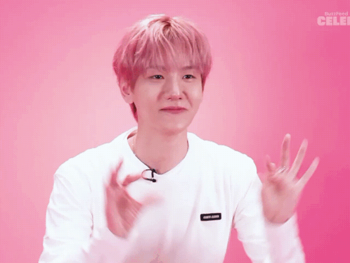 Man with Pink Hair Wearing Buzzfeed Celeb Shirt