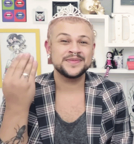 Man With Plastic Tiara Doing Queen Wave GIF
