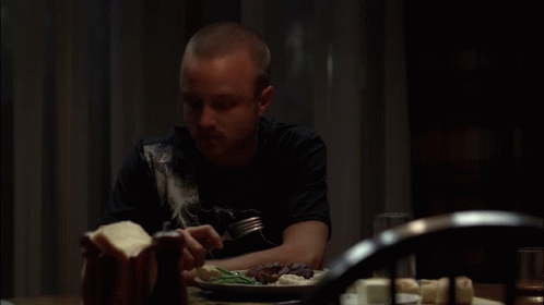 Man with Plate and Salt and Pepper Shaker