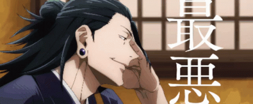 Man with Ponytail and Earrings Smiling
