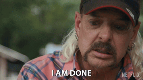 Man with Ponytail and Hat Says I Am Done