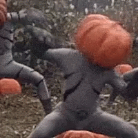 Man With Pumpkin Head Silly Dance GIF