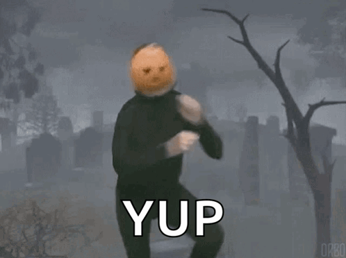 Man With Pumpkin on Head Dancing in Cemetery Saying Yup