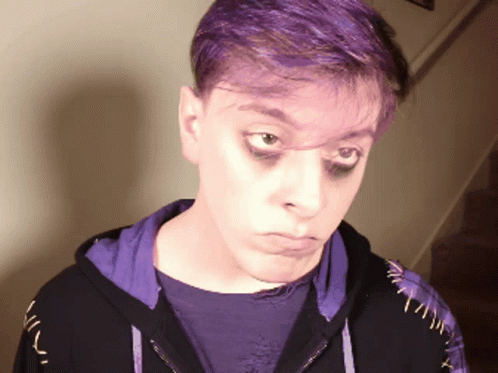 Man with Purple Hair in Purple Hoodie