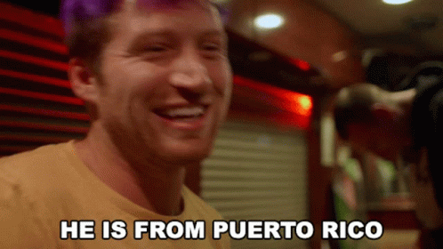 Man with Purple Hair Smiling He Is from Puerto Rico