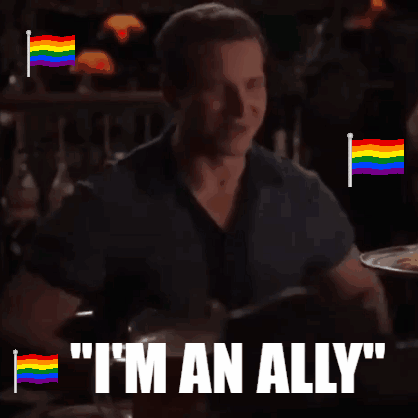 Man with Rainbow Flags Says I'm an Ally
