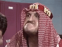 Man With Red and White Scarf Making Funny Face
