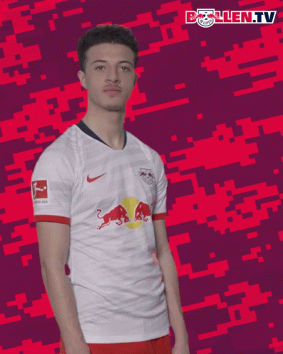 Man With Red Bull on White Shirt