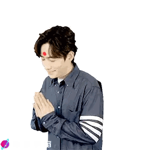 Man with Red Dot and Blue Shirt with Chinese Writing