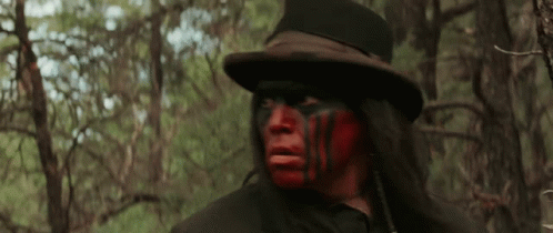 Man With Red Face Paint And Top Hat GIF
