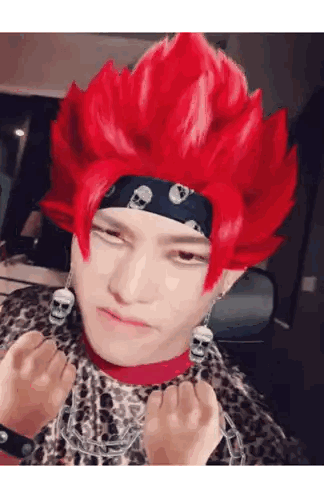 Man with Red Hair and Skull Earrings