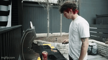 Man with Red Hair Cooking Food