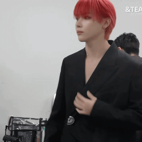 Man With Red Hair In Front Of Tea Sign GIF