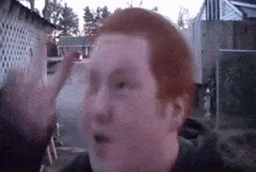 Man with Red Hair Making Funny Face