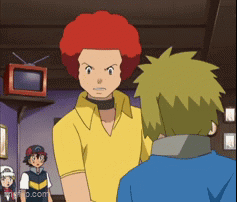Man with Red Hair Talking to Man in Yellow