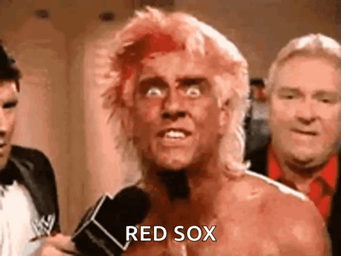 Man with Red Sox Face Paint Speaking