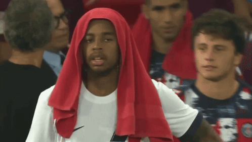 Man With Red Towel on Head