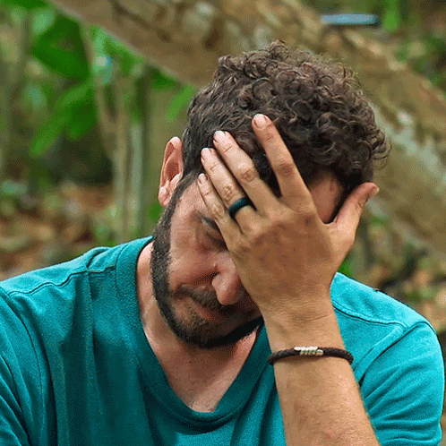 Man With Ring Covering Face