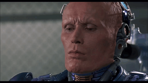 Man With Robot Helmet Close Up