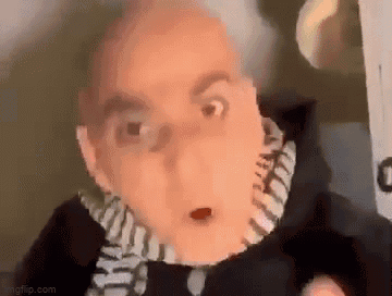 Man With Scarf And Surprised Look GIF