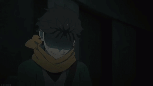 Man with Scarf in Dark Room