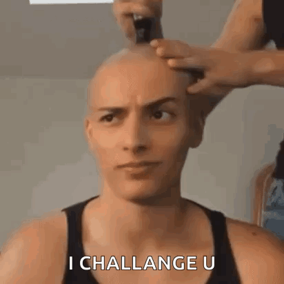 Man with Shaved Head Getting Haircut