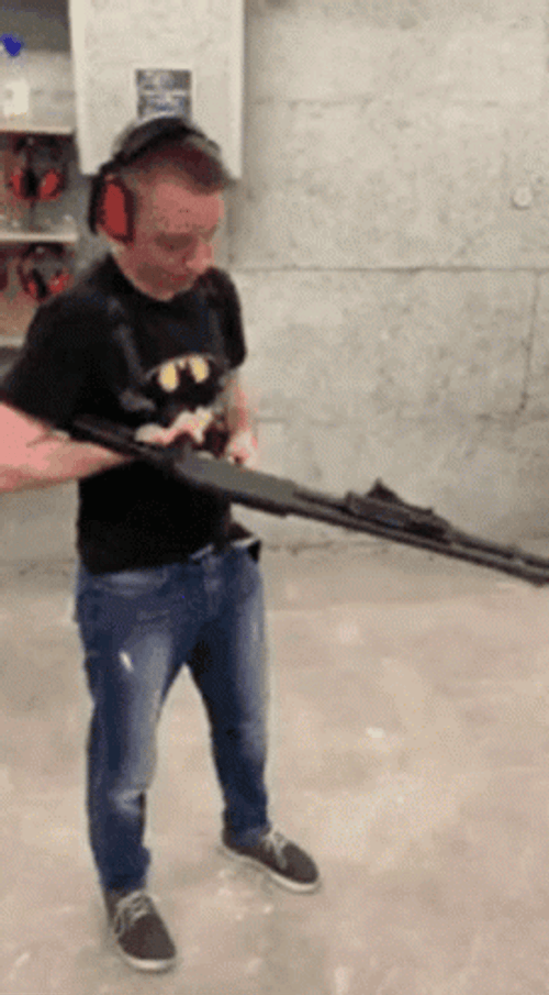 Man With Shotgun Aiming For Accuracy GIF