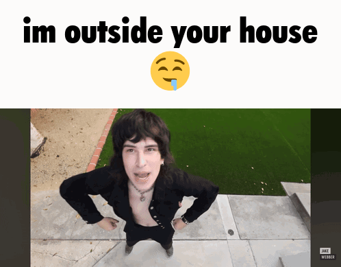 Man With Smiley Face Saying I'm Outside Your House
