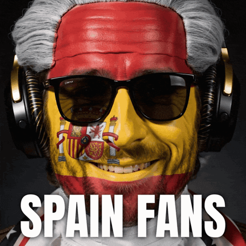 Man With Spanish Flag on Face and Headphones
