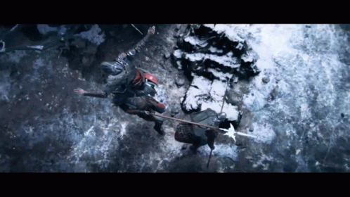 Man With Spear Fighting Another Man in Snow