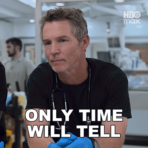 Man With Stethoscope In Front Of Only Time Will Tell Sign GIF