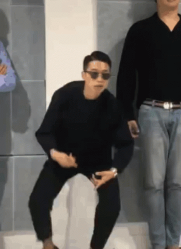 Man With Sunglasses And Black Shirt Sitting GIF