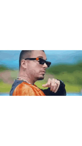 Man with Sunglasses and Orange Shirt Tattoo