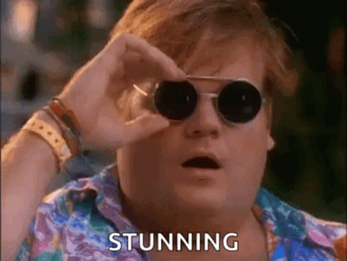 Man with Sunglasses Looking Through Binoculars
