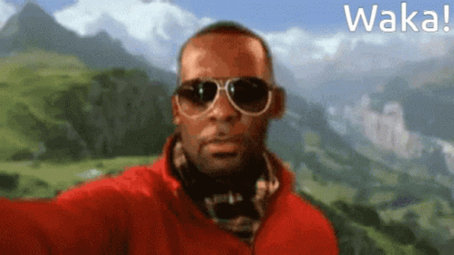 Man With Sunglasses Red Jacket Selfie Mountain Waka